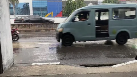 Side view of road in jakarta while rain Stock Footage 287314975