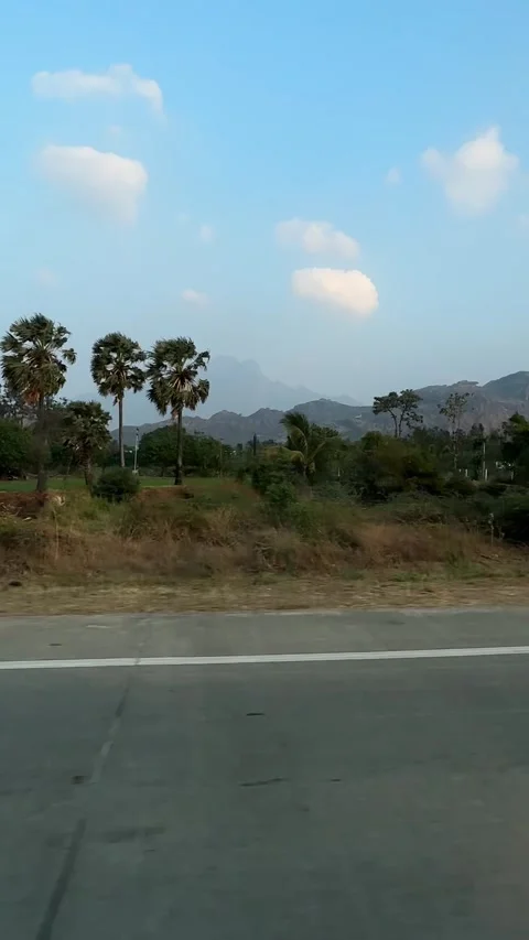 Side view of the road from the window of a moving object, motorcycle cars Stock Footage 321895077