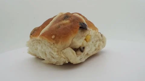 Side View Of A Rotating Hot Cross Bun Rotating On A White Background Stock-Footage 151627878