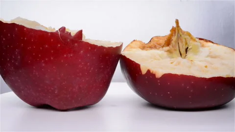 Side view rotten apple pause and rotating Stock Footage 108820025