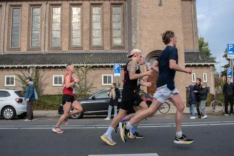 Side View Runners At The TCS Amsterdam Marathon At Amsterdam The Netherland.. Stock Photos