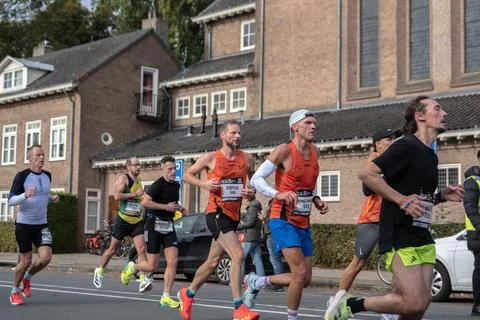 Side View Runners At The TCS Amsterdam Marathon At Amsterdam The Netherland.. Stock Photos