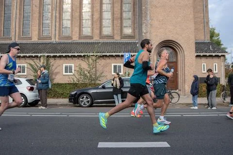 Side View Runners At The TCS Amsterdam Marathon At Amsterdam The Netherland.. Stock Photos