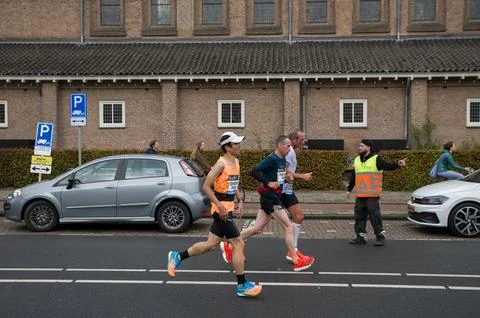Side View Runners At The TCS Marathon At Amsterdam The Netherlands 20-10-2024 Stock Photos