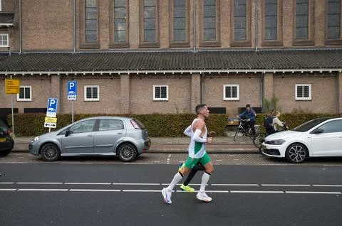 Side View Runners At The TCS Marathon At Amsterdam The Netherlands 20-10-2024 Stock Photos