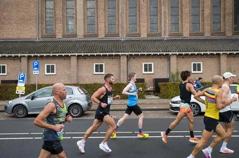 Side View Runners At The TCS Marathon At Amsterdam The Netherlands 20-10-2024 Stock Photos