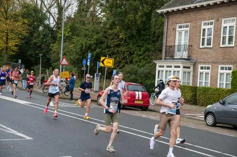 Side View Runners At The TCS Marathon At Amsterdam The Netherlands 20-10-2024 Stock Photos