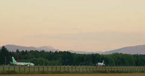 Side view of Saab 340A(F) touchdown Stock Footage 220954802