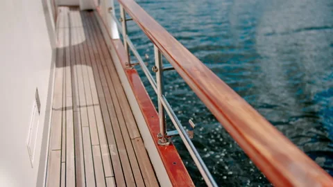 Side view of sailing boat walking on water. Luxury cruise yacht at seaward Stock Footage 133035005