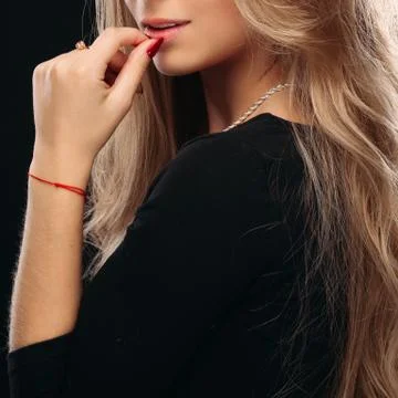 Side view of seductive and beautiful girl touching lips. Fotos Stock