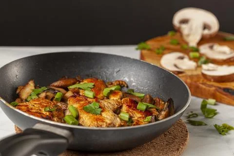 Side view selective focus image of sauteed roasted chicken breasts in a non s Stock-Fotos