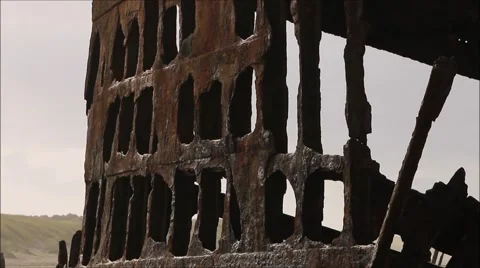 Side view of Shipwreck on Beach Stock Footage 56024785