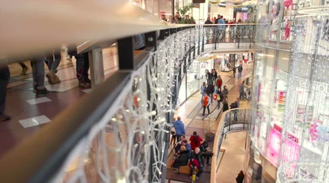 Side view of shopping mall floors full of people Stock Footage 61195757