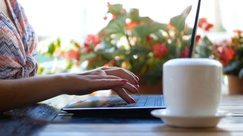 Side view shot of beautiful young hipster woman's hands busy working on her Video stock 100028192