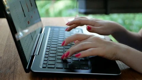 Side view shot of beautiful young hipster woman's hands busy working on her Video stock 100759870