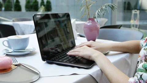 Side view shot of beautiful young hipster woman's hands busy working on her Video stock 102391571