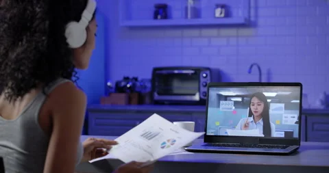 Side view shot of a young, exhausted and tried Asian woman call with co-worker. Stock Footage 153517892