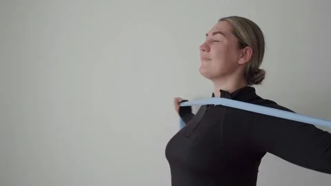 Side View Shoulder Band Pull-Apart Exercise for Mobility and Rehab Stock Footage 340883960