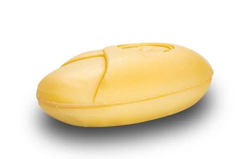 Side view of single yellow organic bar soap. Stock Photos