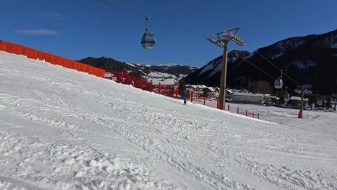 Side View of Skiers and Cable Cars, Italy Video stock 304437280