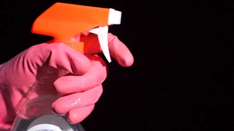 Side view slow motion spray bottle spraying cleaning product Stock-Footage 127006190