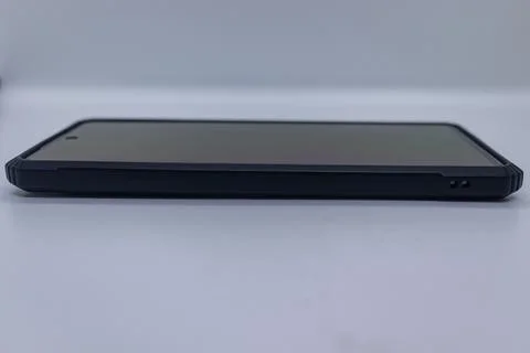 Side View of Smartphone with Protective Case and Screen Stock Photos