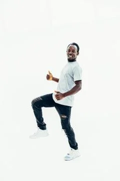 Side view. smiling handsome guy showing thumbs up Stock Photos