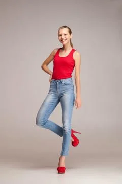 Side view of smiling model looking at camera Stock Photos