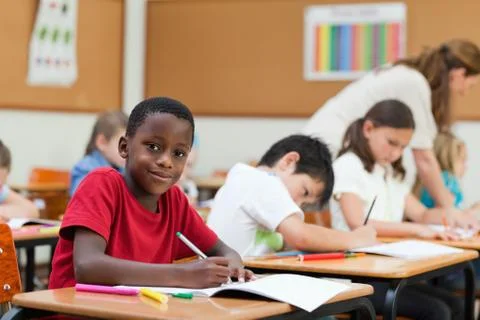Side view of smiling student during class Fotos Stock