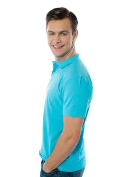 Side view of smiling young man Stock Photos