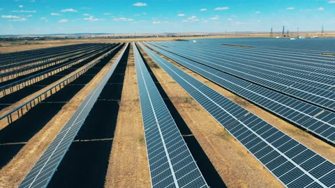 Side view of solar power panels in lines. Solar power, solar panel, solar farm Stock Footage 140801082