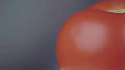 Side View of Spinning Tomato on Dark Background Video stock 330941910