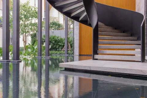 Side view of a spiral staircase pattern. Spiral stairs circle in courtyard ar Stock Photos