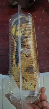 Side view of sponge cake with chocolate filling and melted cheese Stock Photos