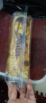 Side view of sponge cake with chocolate filling and melted cheese Stock Photos