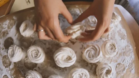 Side view of a spoon breaking the burnt sugar crust of a Creme brle Stock Footage 85765397