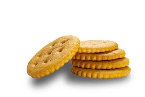 Side view stack of crunchy salted round crackers isolated on white backgro... Stock-Fotos