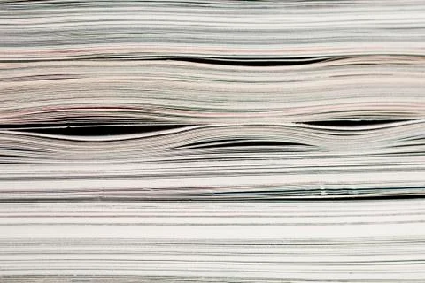 Side view of stack of papers, books, and magazines for recycling. Stock Photos