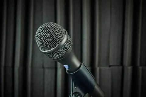 Side view of Stand-mounted dynamic microphone for vocals and choirs, gray, on Stock Photos