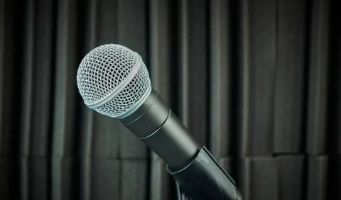 Side view of Stand-mounted dynamic microphone for vocals and choirs, gray, on Stock Photos