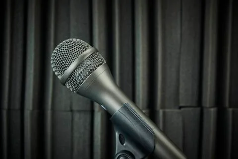 Side view of Stand-mounted dynamic microphone for vocals and choirs, gray, on Stock Photos