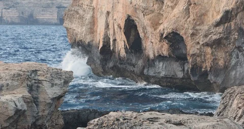 Side view of stormy waves on cliffs Stock Footage 104790982