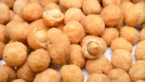 Side view tasty peanuts snack turning Stock Footage 137254127