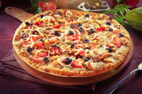 Side view Tomato sauce, mozzarella, gorgonzola cheese pizza in wooden round Stock Photos