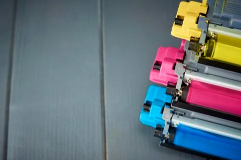 Side view of toner replacement for cyan, magenta and yellow color laser print Stock Photos