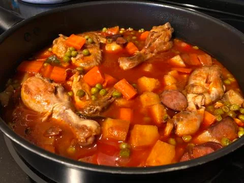 Side view, top shot of a chicken menudo dish, popular in the Philippines. Stock Photos