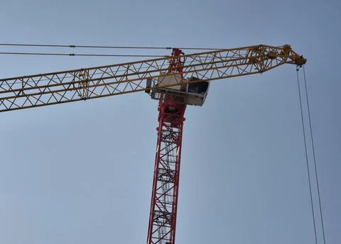 Side View of Tower Crane Operator Cabin Assembly with Mobile Crane Jib Stock Photos