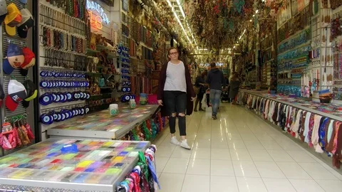 Side view tracking shot camera moves forward, Monastiraki Market different shops Stock Footage 92440015