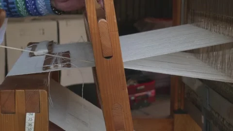 Side View of Traditional Loom Weaving Process with Shuttle Stock Footage 316486903