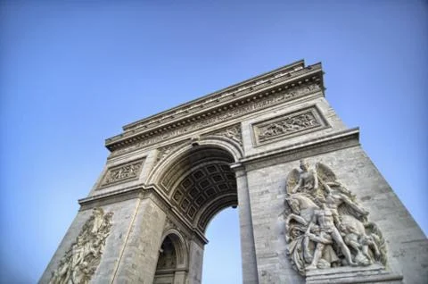 Side view of Triumph Arc at winter sunset - Paris Stock Photos